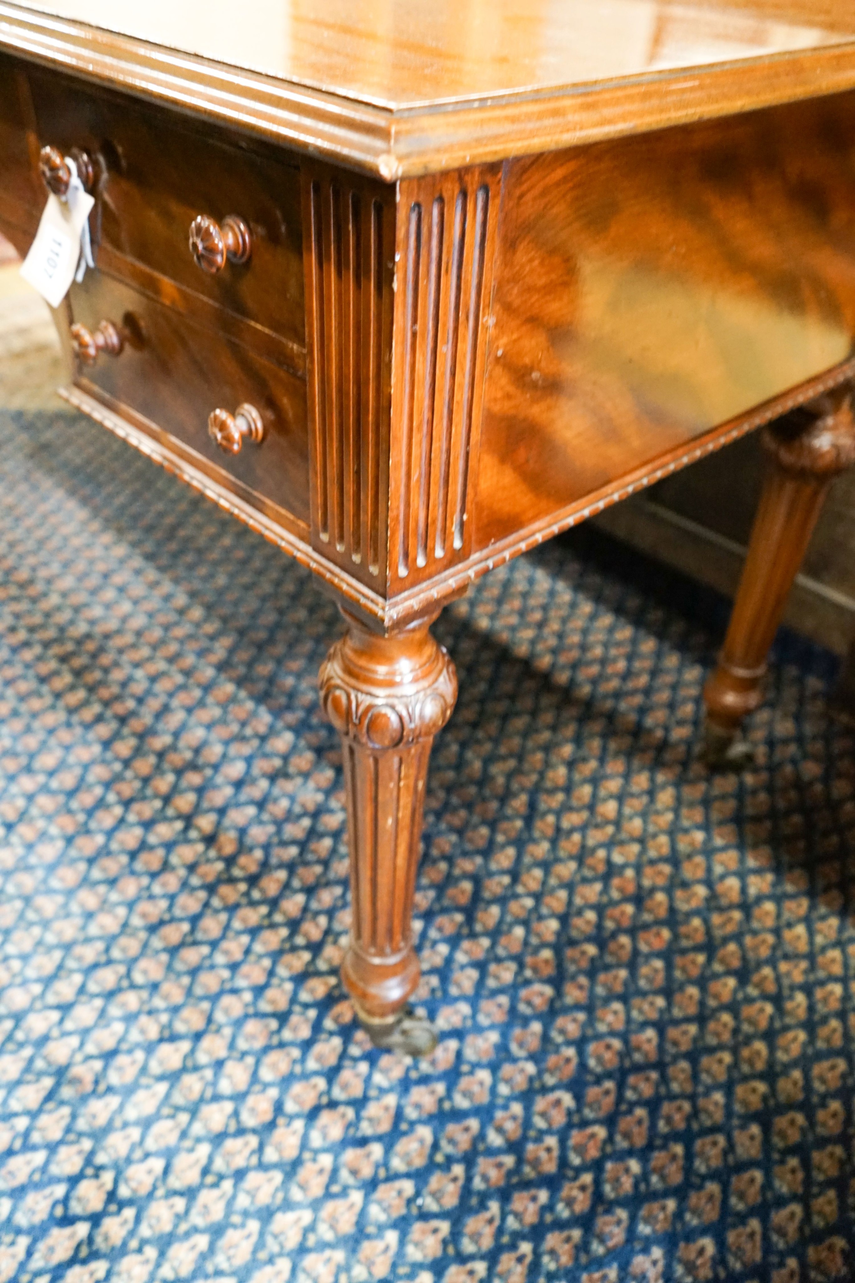 A Victorian mahogany dressing-cum-writing table